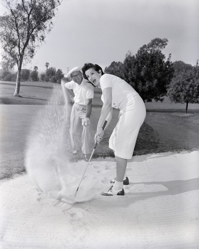 galleries/2013/08/11/old-school-golfing-with-the-stars-photos/celebs-golf-russell_pzg5of