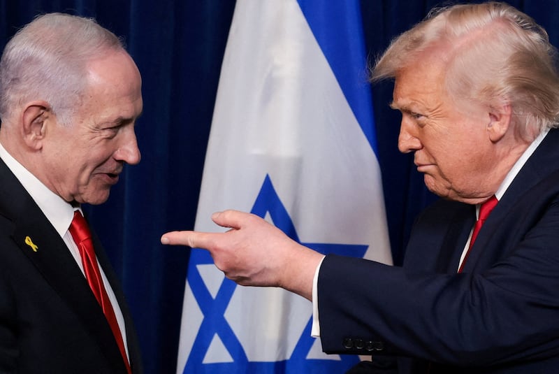 President Donald Trump points his finger at Prime Minister of Israel Benjamin Netanyahu.