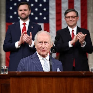 Vice President JD Vance and House Speaker Mike Johnson applaud as Britain's King Charles arrives to address a joint meeting of Congress in the House Chamber of the U.S. Capitol in Washington, D.C., U.S., April 28, 2026.