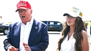 US President Donald Trump, alongside Secretary of Homeland Security Kristi Noem