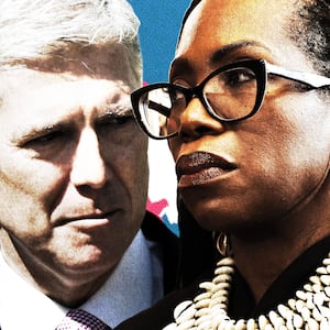 Ketanji Brown Jackson and Neil Gorsuch in front of a Colorado flag