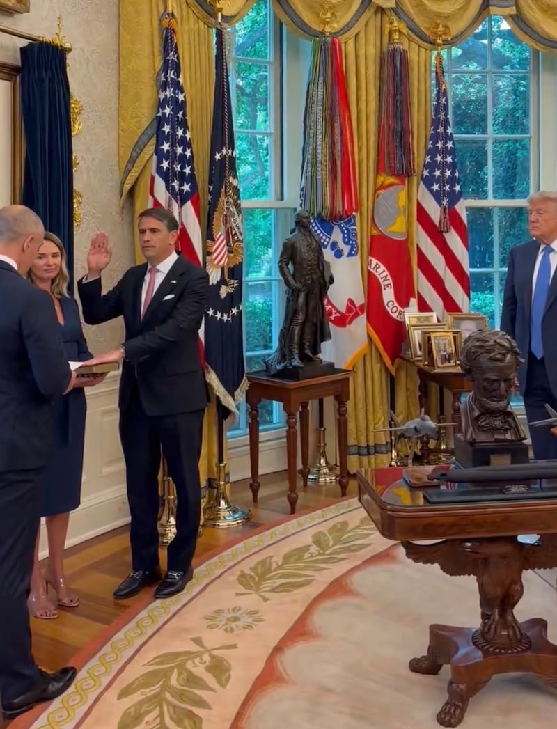 Todd Blanche being sworn in