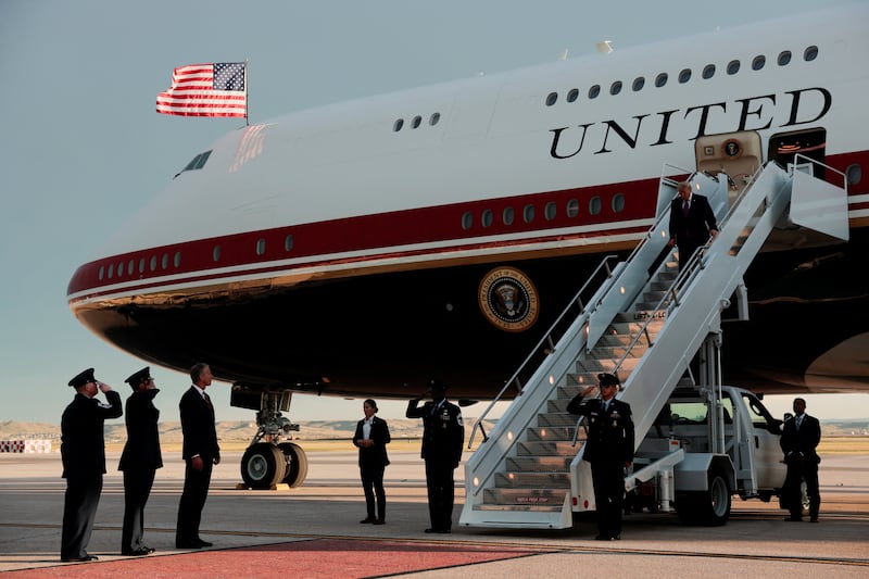 Trump deboards the new Air Force One, a plane gifted by Qatar, upon arrival in South Dakota last Friday.