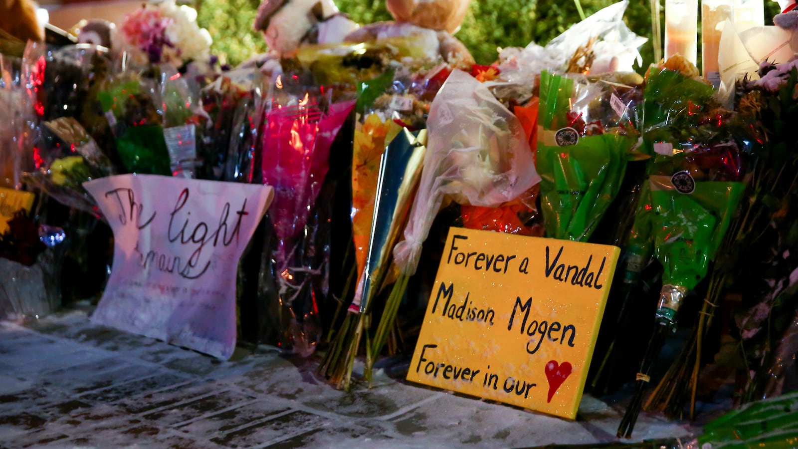 A sign for Madison Mogen, one of four University of Idaho students found killed in their residence on Nov. 13, is seen at a memorial in front of a University of Idaho campus sign, in Moscow, Idaho, Nov. 29, 2022.