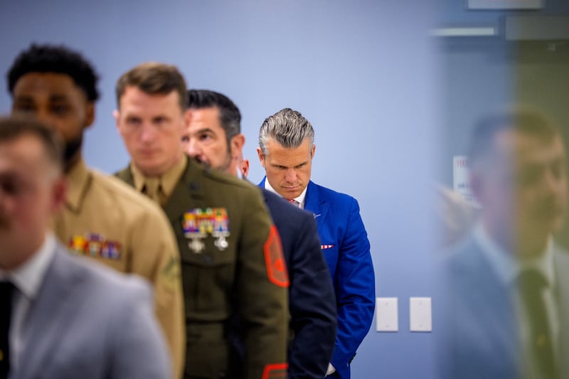 ARLINGTON, VIRGINIA - AUGUST 26: Secretary of War Pete Hegseth (R) arrives for an event to honor Marines who were serving during the 2021 Abbey Gate bombing at the Pentagon on August 26, 2026 in Arlington, Virginia. Three U.S. Marines from Golf Company have their valor awards formally upgraded to honor their heroism and lifesaving actions during the 2021 Abbey Gate bombing at Hamid Karzai International Airport in Kabul. (Photo by Andrew Harnik/Getty Images)