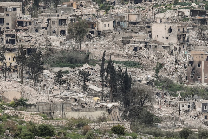 A photograph shows destroyed buildings in southern Lebanon on April 15, 2026. Lebanon was drawn into the Middle East war in early March when the Tehran-backed Hezbollah launched rockets towards Israel to avenge a US-Israeli attack that killed Iran's supreme leader. Israel has responded with massive strikes across Lebanon and a ground offensive.