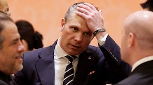 U.S. Secretary of Defense Pete Hegseth reacts prior to a state banquet hosted by Chinese President Xi Jinping at the Great Hall of the People on May 14, 2026 in Beijing, China.