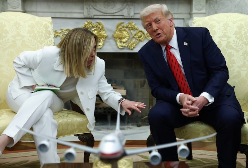 U.S. President Donald Trump meets with Italian Prime Minister Giorgia Meloni in the Oval Office at the White House in Washington, D.C., U.S., April 17, 2025. REUTERS/Evelyn Hockstein