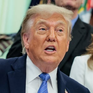 U.S. President Donald Trump speaks in the Oval Office as he signs the Secure America Act, at the White House in Washington, D.C., U.S., June 10, 2026.