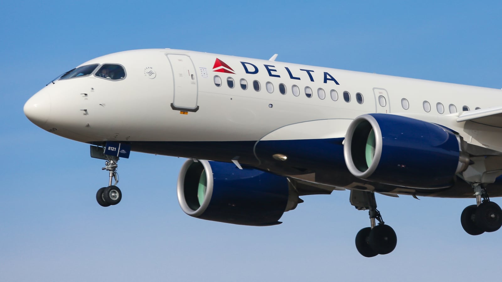 Delta Air Lines Airbus A220-100 aircraft as seen on final approach landing with landing gear down at New York JFK John F. Kennedy International Airport on 14 November 2019 in New York, US. The airplane has the registration N121DU, 2x PW jet engines. The renamed Airbus A220 airliner was Bombardier CS100, BD-500-1A10. Delta Air Lines DL Delta is the largest airline carrier in the world with a hub in New York-JFK. (Photo by Nicolas Economou/NurPhoto via Getty Images)