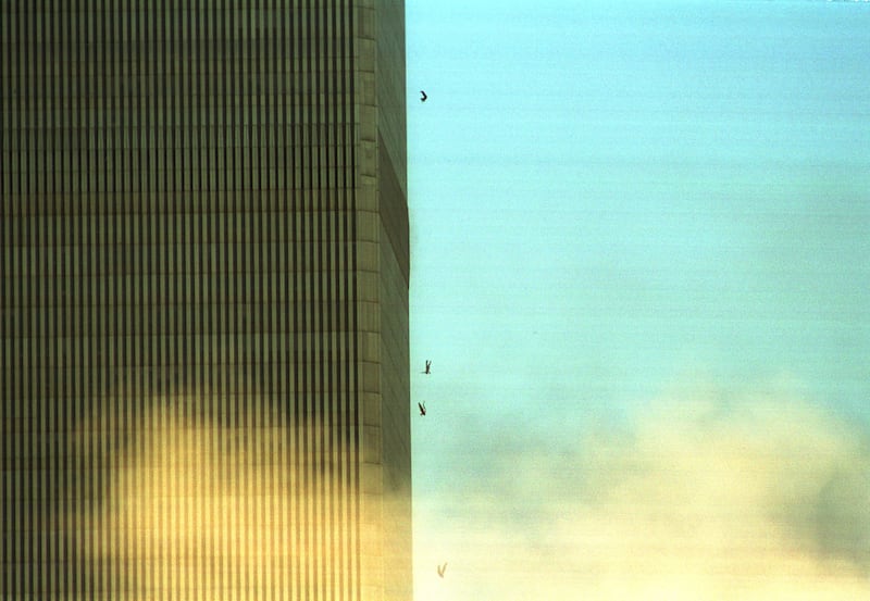 People jump to their deaths from the World Trade Center after it was hit by two planes.