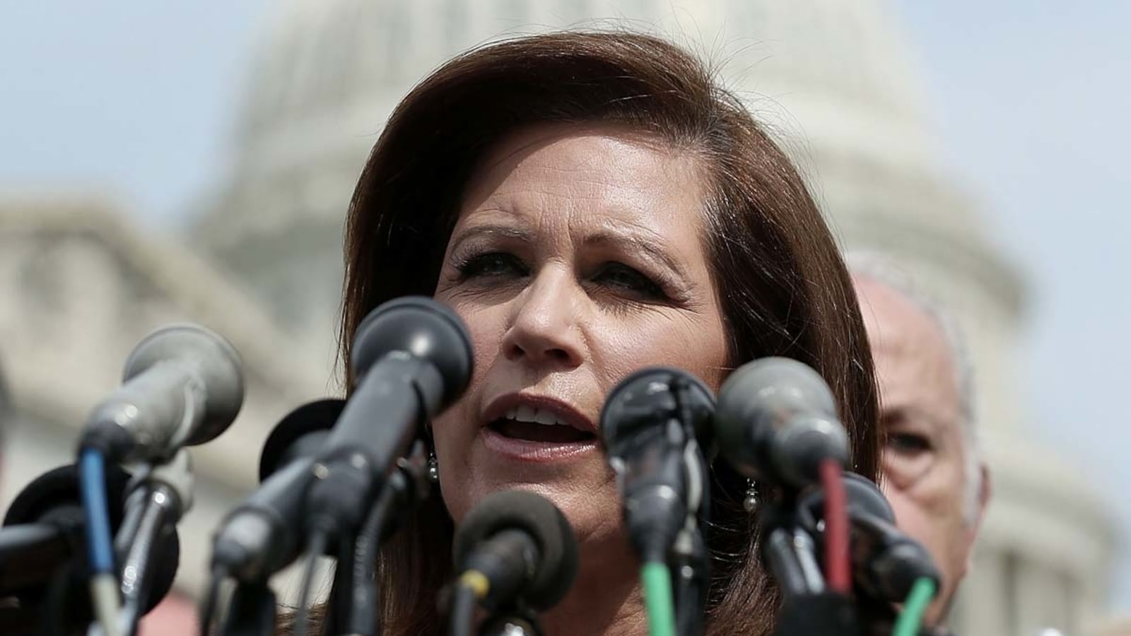 cheats/2013/05/29/bachmann-not-running-for-re-election/bachmann-microphones-tease_uoqu78