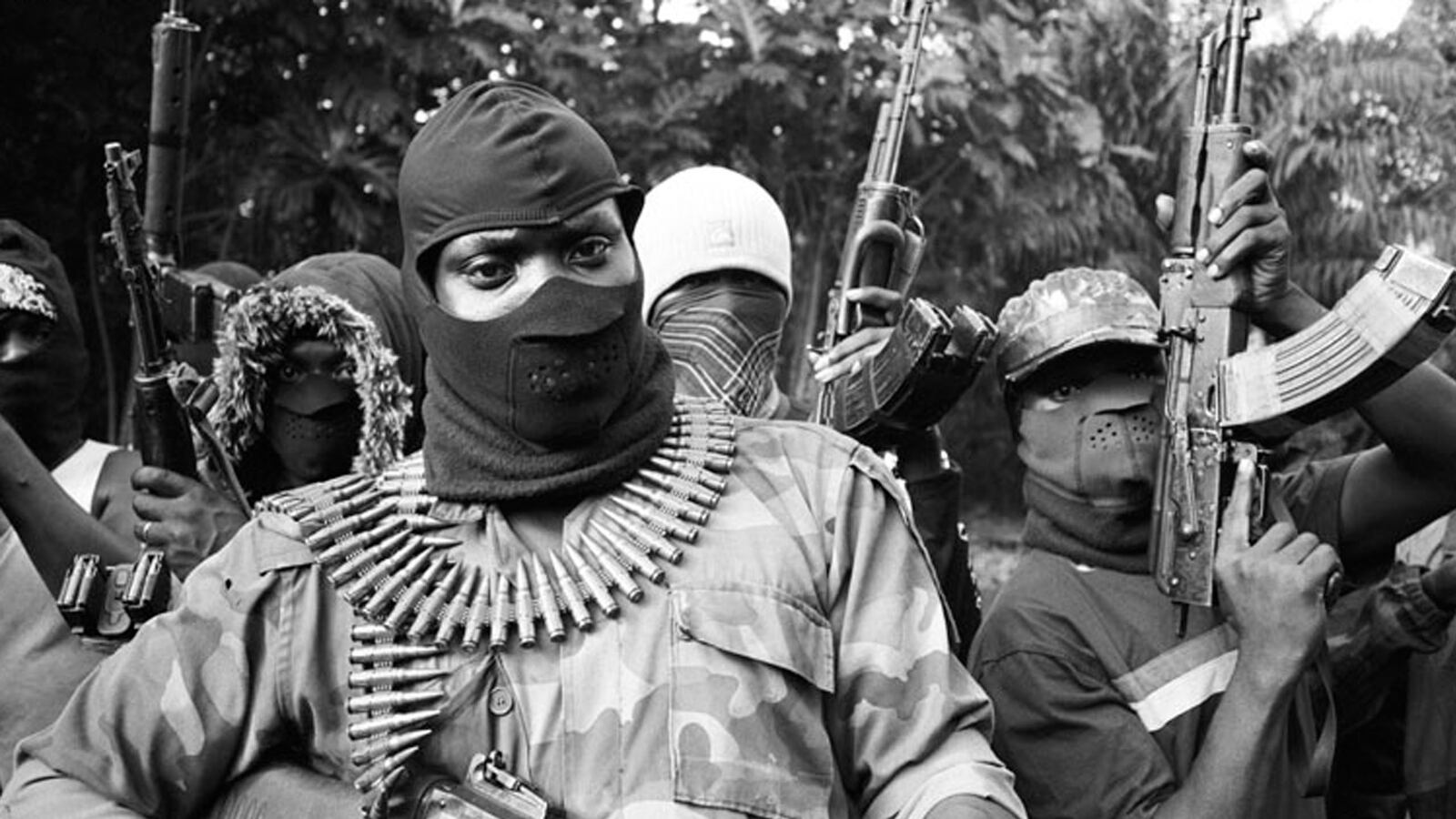 articles/2014/03/14/crude-power-the-truth-about-africa-s-oil-millions/140313-grove-big-men-tease_ioapuu