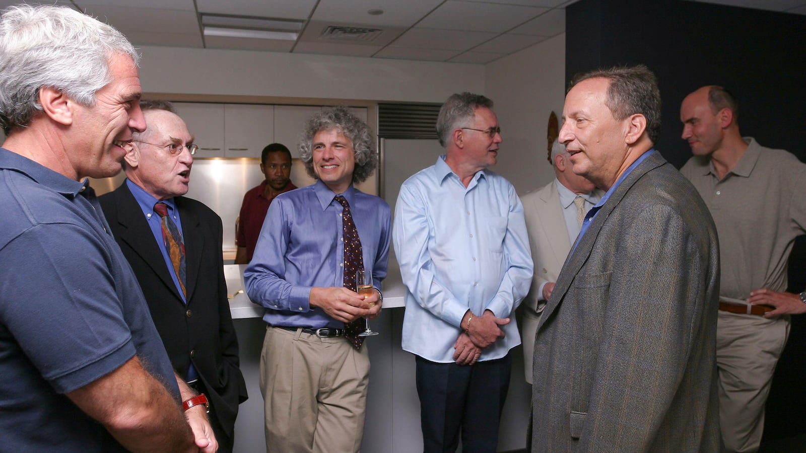Jeffrey Epstein at a dinner he hosted at Harvard University with Harvard Professors , Alan Dershowitz, Stephen Pinker, Princeton Professor Robert Trivers, Larry Summers, Martin Nowak on September 9, 2004