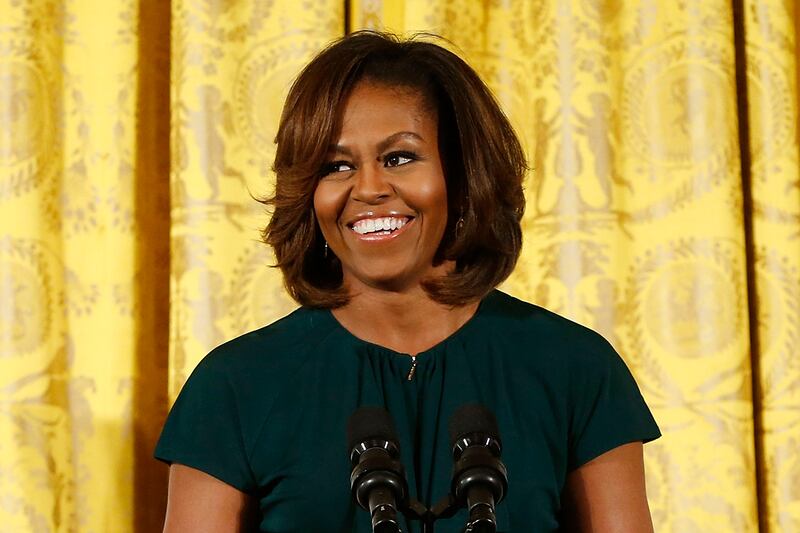 articles/2014/06/09/michelle-obama-talks-beauty-at-maya-angelou-s-memorial-david-beckham-designs-collection-for-belstaff/140609-mobama-beauty-cheat_wxwgbk