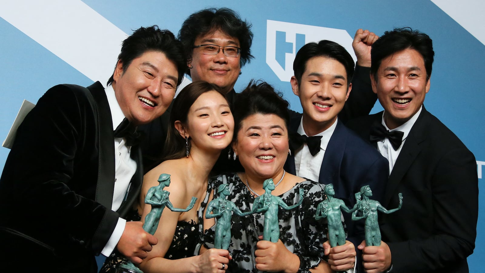 The "Parasite" cast poses at the 26th Annual Screen Actors Guild Awards in 2020, including Director Bong Joon-ho (back) and recently deceased Lee Sun-Kyun (far-right).