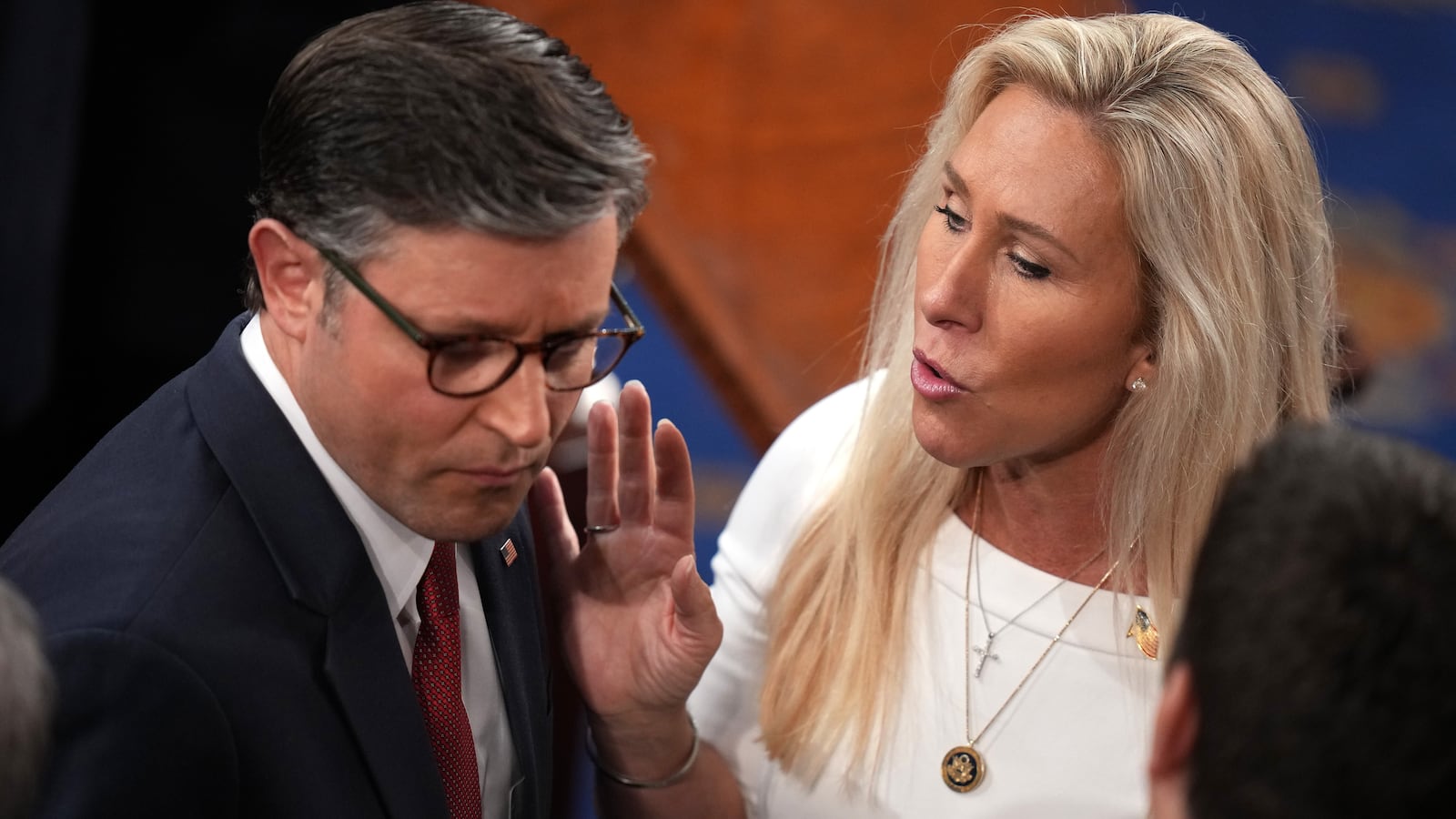 Speaker of the House Mike Johnson (R-LA) (L) talks to Rep. Marjorie Tayler Greene (R-GA) as they arrive for the first day of the 119th Congress in the House Chamber of the U.S. Capitol Building on January 03, 2025 in Washington, DC.