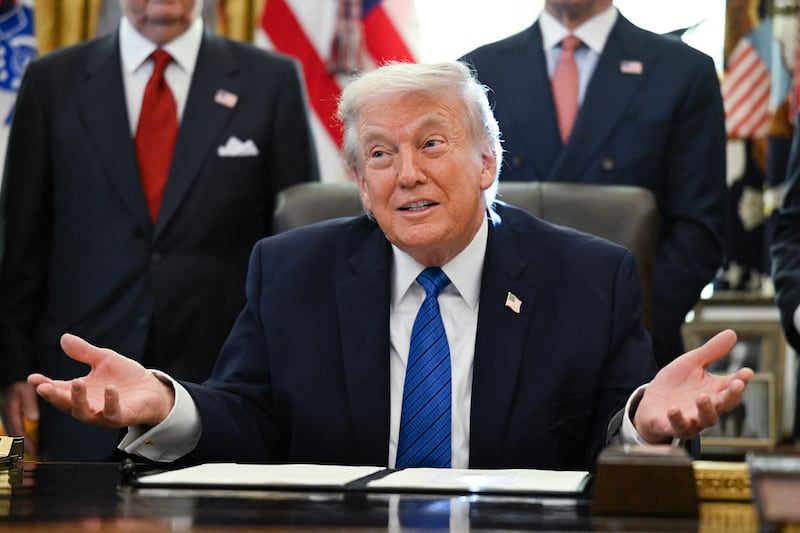 President Donald Trump speaks before signing executive orders in the Oval Office in the White House in Washington, DC, on January 30, 2026