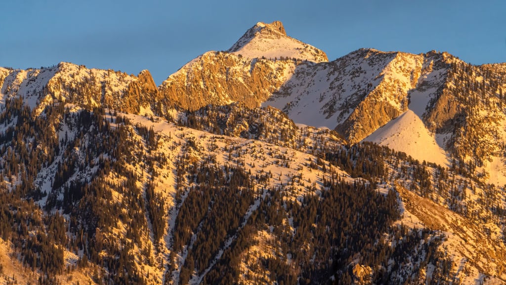 Two skiers died in an avalanche near Lone Peak, a mountain in the Wasatch Front bordering the Salt Lake Valley and Salt Lake City, Utah, authorities said.