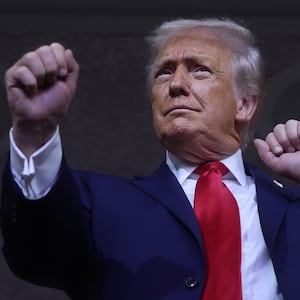 WASHINGTON, DC - DECEMBER 05: U.S. President Donald Trump dances to the final performance of the Village People during the FIFA World Cup 2026 Official Draw at John F. Kennedy Center for the Performing Arts on December 05, 2025 in Washington, DC. (Photo by Hector Vivas - FIFA/FIFA via Getty Images)