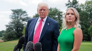 U.S. President Donald Trump, joined by White House Press Secretary Karoline Leavitt, speaks to the media as he departs the White House on July 15, 2025 in Washington, DC.