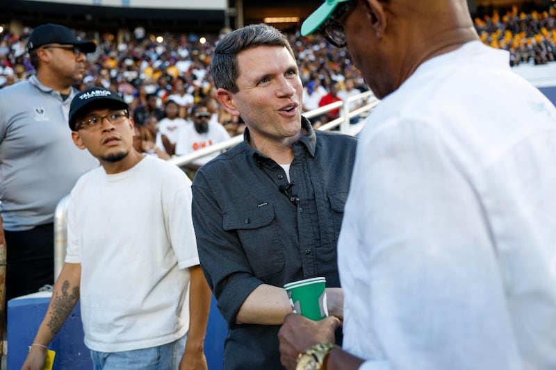 Democratic Senate candidate James Talarico shakes hands with people on the sideline during the first half of the State Fair Classic between Grambling State and Prairie View A&M at the State Fair of Texas on Saturday, Sept. 26, 2026, in Dallas.