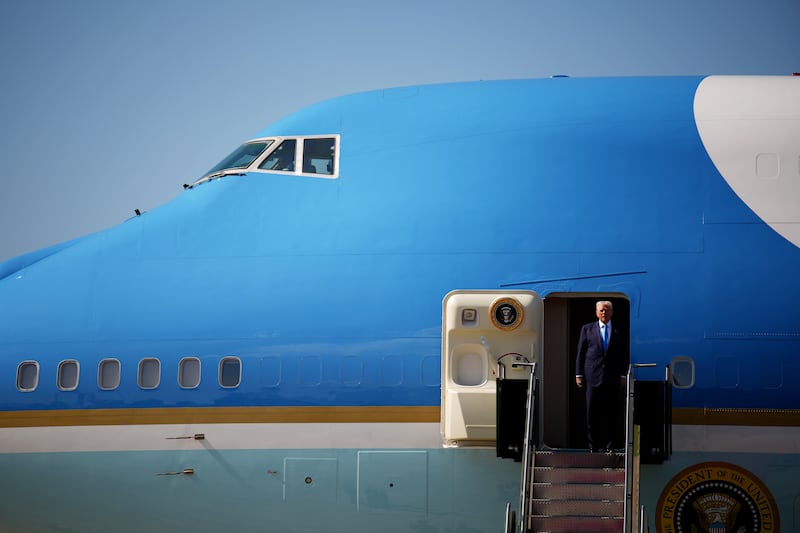 President Donald Trump disembarks Air Force One as he arrives at Gimhae International Airport on October 29, 2025 in Busan, South Korea.