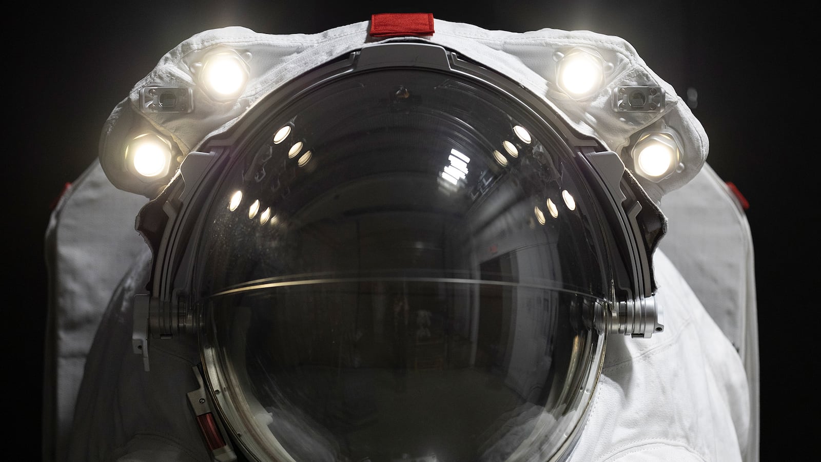 A closeup of the helmet on a Prada-designed NASA spacesuit.