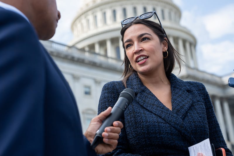 U.S. Representative Alexandria Ocasio-Cortez (D-NY) speaks with members of the media after U.S. House of Representatives approved legislation to avert a government shutdown before the midterm elections, outside the U.S. Capitol in Washington, D.C., U.S., September 1, 2026. REUTERS/Aaron Schwartz