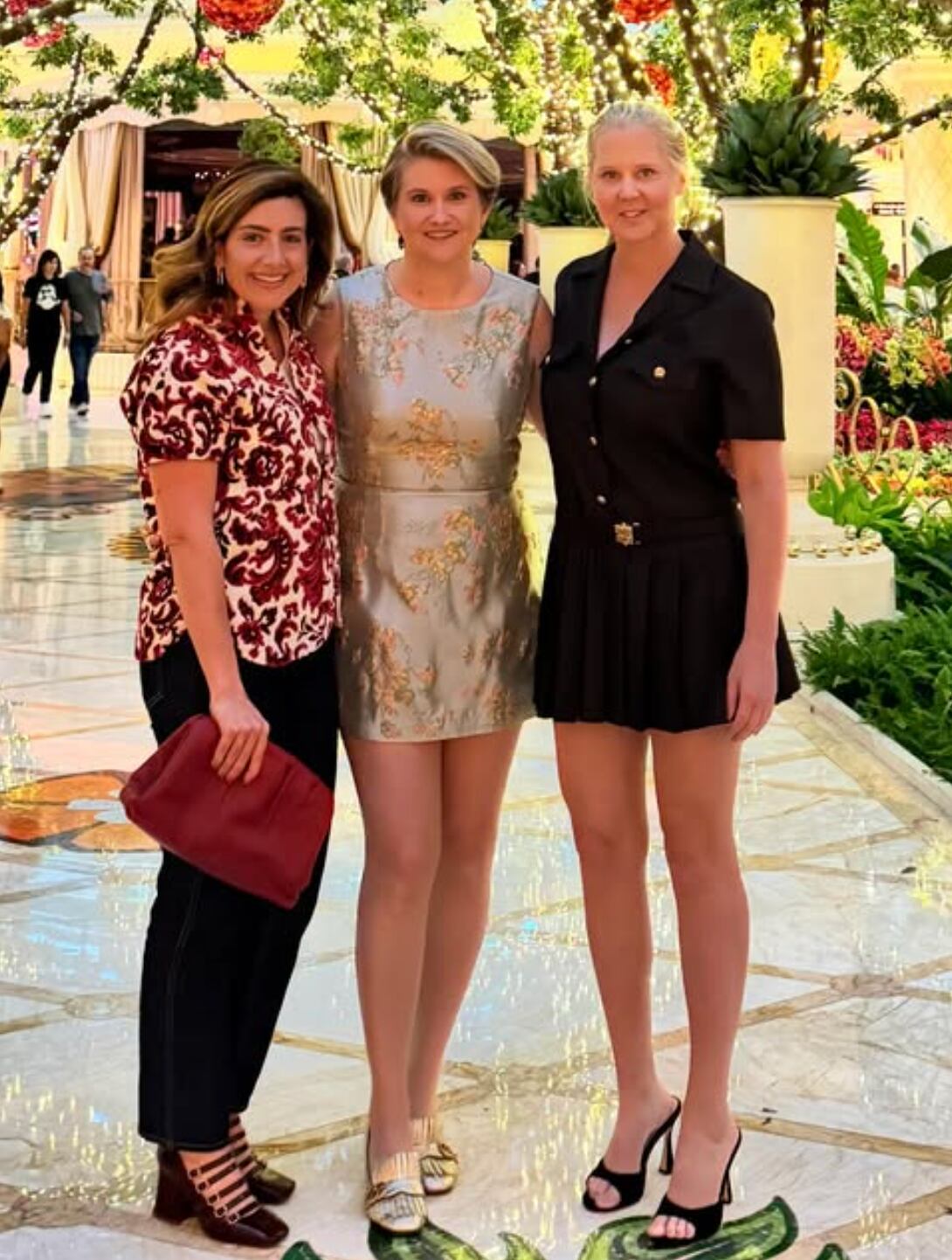 Producer Alex Saks, actress Jillian Bell, and Amy Schumer in Las Vegas.