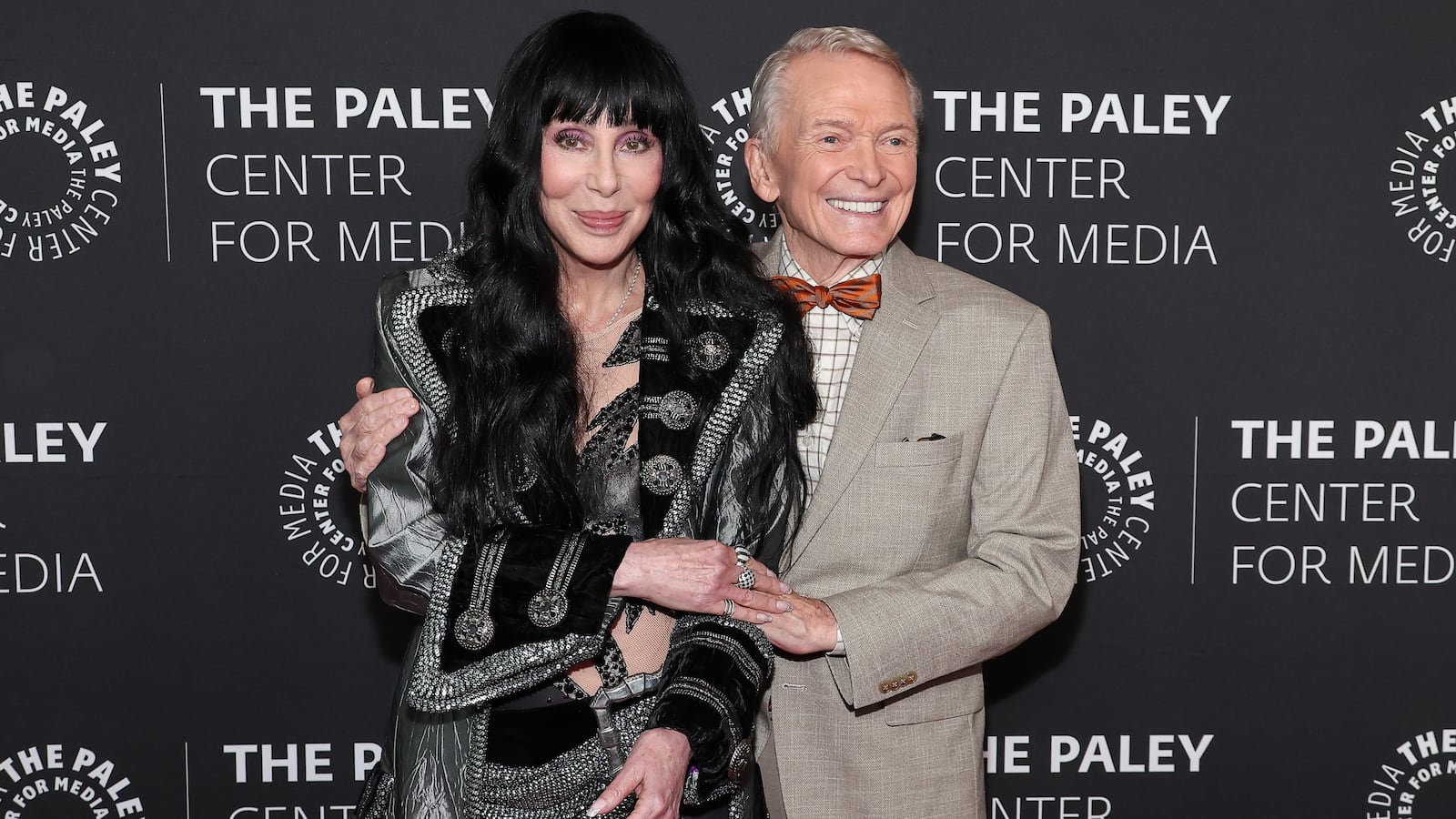 Cher and Bob Mackie at the world premiere of "Bob Mackie: Naked Illusion" hosted by The Paley Center for Media and held at the Directors Guild of America on May 13, 2024 in Los Angeles, California.