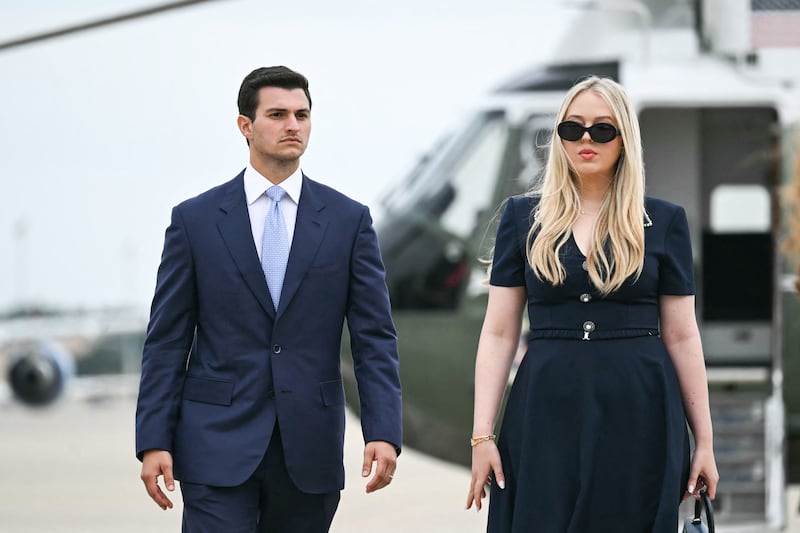 Tiffany Trump and her husband Michael Boulos walk to board Air Force One at Joint Base Andrews, Maryland on September 16, 2025.