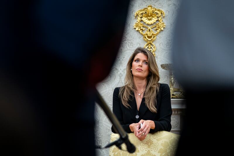 WASHINGTON, DC - MARCH 31: Lindsey Halligan, attorney for U.S. President Donald Trump, looks on during an executive order signing in the Oval Office of the White House, on March 31, 2025 in Washington, DC. (Photo by Al Drago/Getty Images)