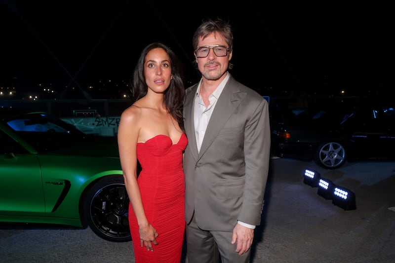 Ines de Ramon and Brad Pitt at the Mercedes-AMG World Premiere held at Sixth Street Bridge on May 19, 2026 in Los Angeles, California. (Photo by Christopher Polk/WWD via Getty Images)
