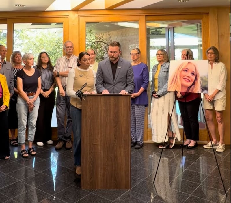 Sky and Amanda Roberts speak at a press conference on October 5 after releasing a campaign ad blasting their congressman over the Epstein files.