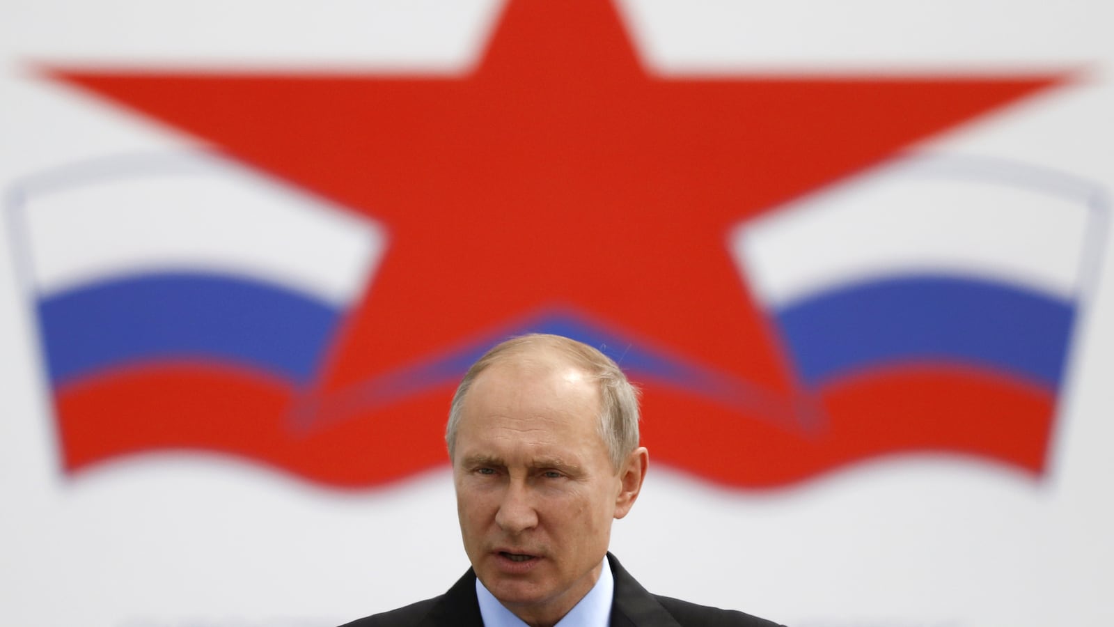 Russian President Vladimir Putin delivers a speech at the Zvezda shipyard in Bolshoy Kamen