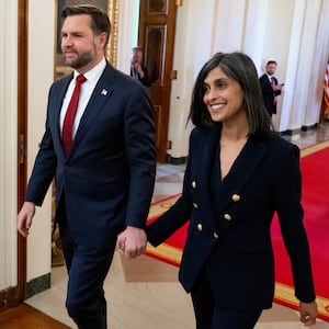 US Vice President JD Vance and Second Lady Usha Vance arrive for President Donald Trump to sign an executive order on foster children and families in the East Room of the White House in Washington, DC, November 13, 2025. The executive order will be focused on supporting foster youth transitioning out of the system to adulthood by expanding and enhancing access to education, workforce and career development, digital resources, and other supports. (Photo by SAUL LOEB / AFP) (Photo by SAUL LOEB/AFP via Getty Images)