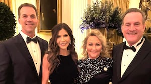 Kristi Noem appears with her husband, Bryon, speaking yet more speculation about her rumored affair with Corey Lewandowski.