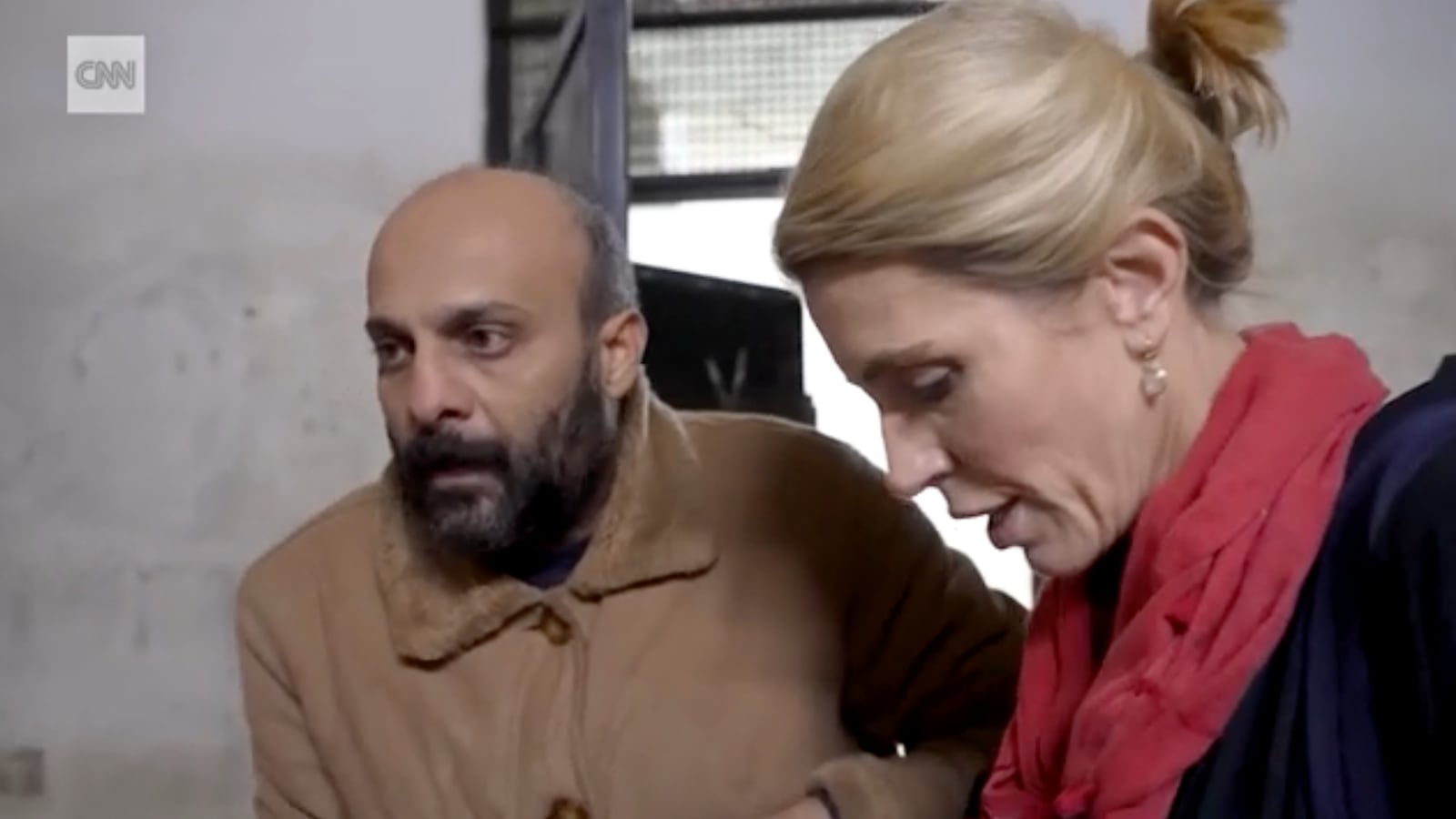 CNN's Clarissa Ward and a man whose identity has been questioned by a Syrian fact checking group appear in a December 12 CNN segment.