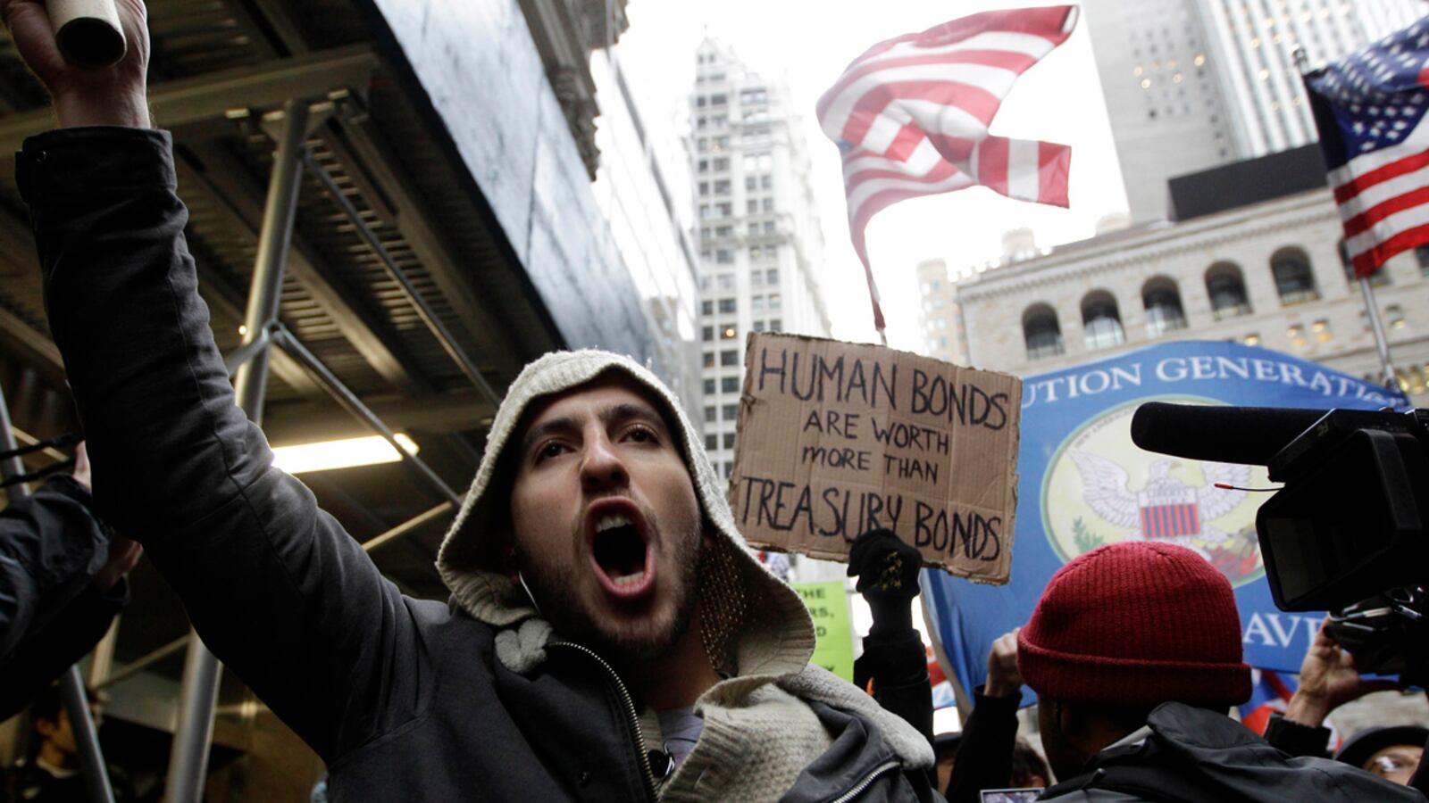 articles/2011/11/17/occupy-wall-street-shows-its-muscle-with-massive-protest/occupy-wall-street-returns-goldberg_k69yie