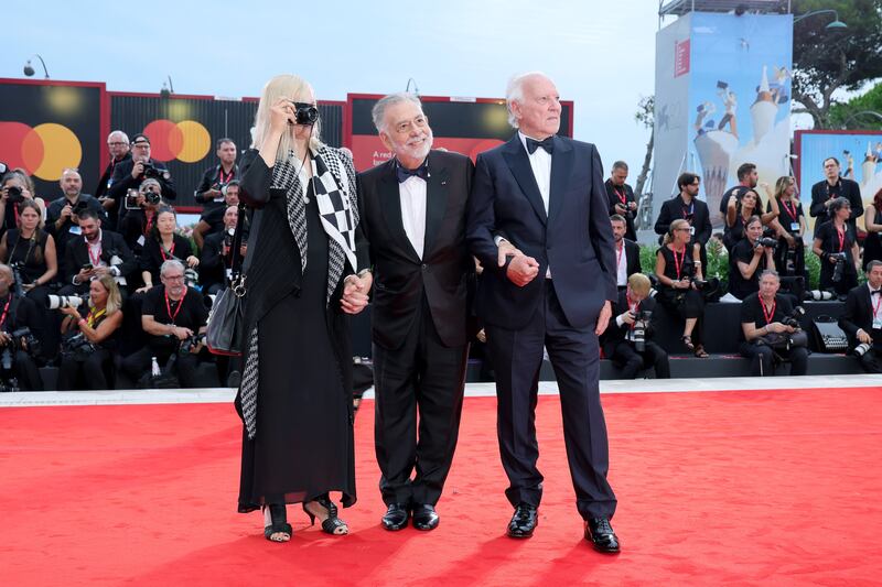 Lena Herzog, Francis Ford Coppola and Werner Herzog attend the "La Grazia" red carpet during the 82nd Venice International Film Festiva
