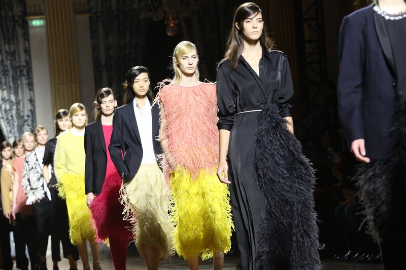 articles/2013/02/27/dries-van-noten-trades-tomboy-look-for-feathers-fall-2013/130227-dries-van-noten-sidell-tease_c5j8wh