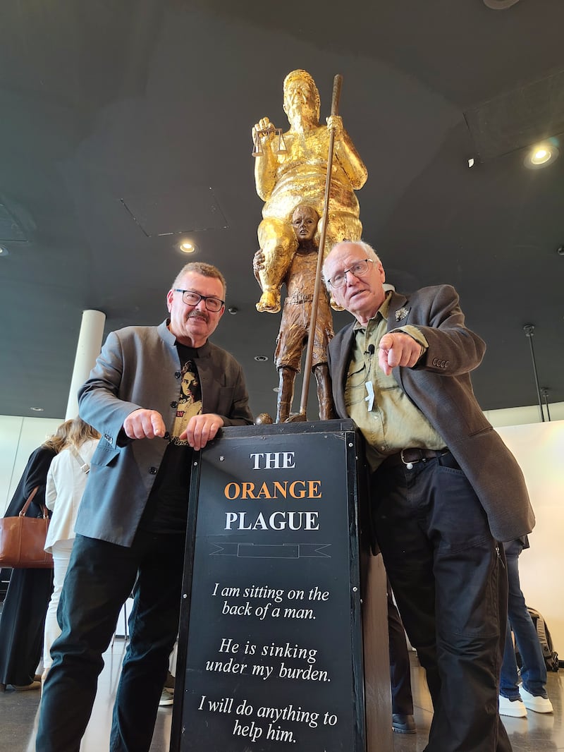 Jens Galschiot and Trump statue.