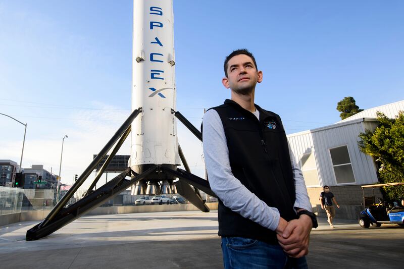 Jared Isaacman stands for a portrait in front of the recovered first stage of a Falcon 9 rocket at Space Exploration Technologies Corp. (SpaceX) on February 2, 2021 in Hawthorne, California. -