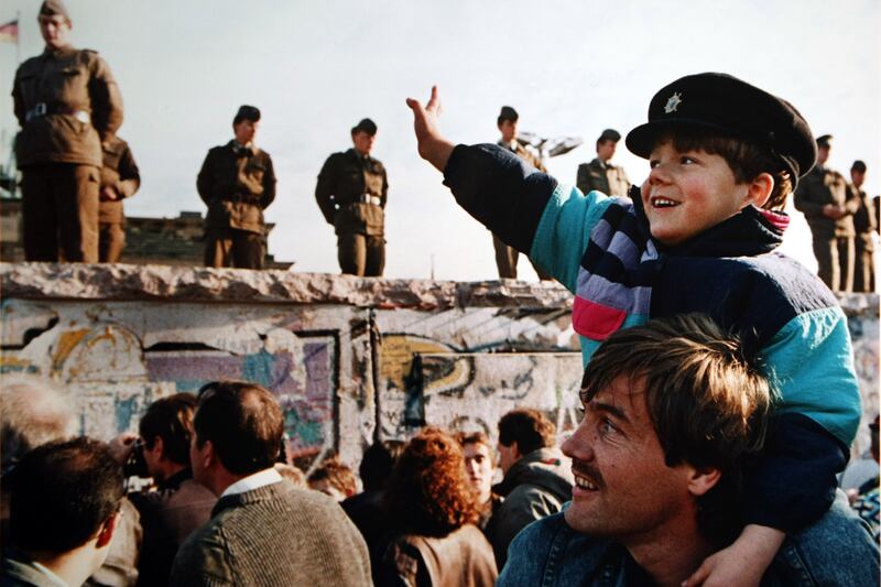 galleries/2014/11/07/a-wall-falls-and-a-cold-war-ends-photos/141107-berlin-wall3_mzjcm3