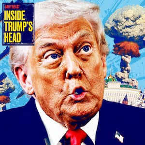 A scared Donald Trump surrounded by nuclear explosions, missiles and The Kremlin over his shoulder.