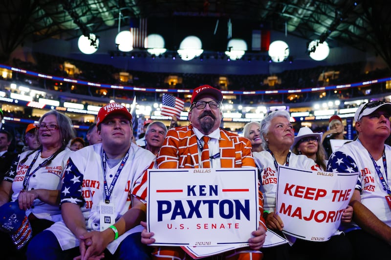 Blake Marnell, wearing a suit jacket with bricks representing a border wall listens as U.S. President Donald Trump speaks on the first day of the 2026 Republican National Convention at the American Airlines Center on September 09, 2026 in Dallas, Texas.