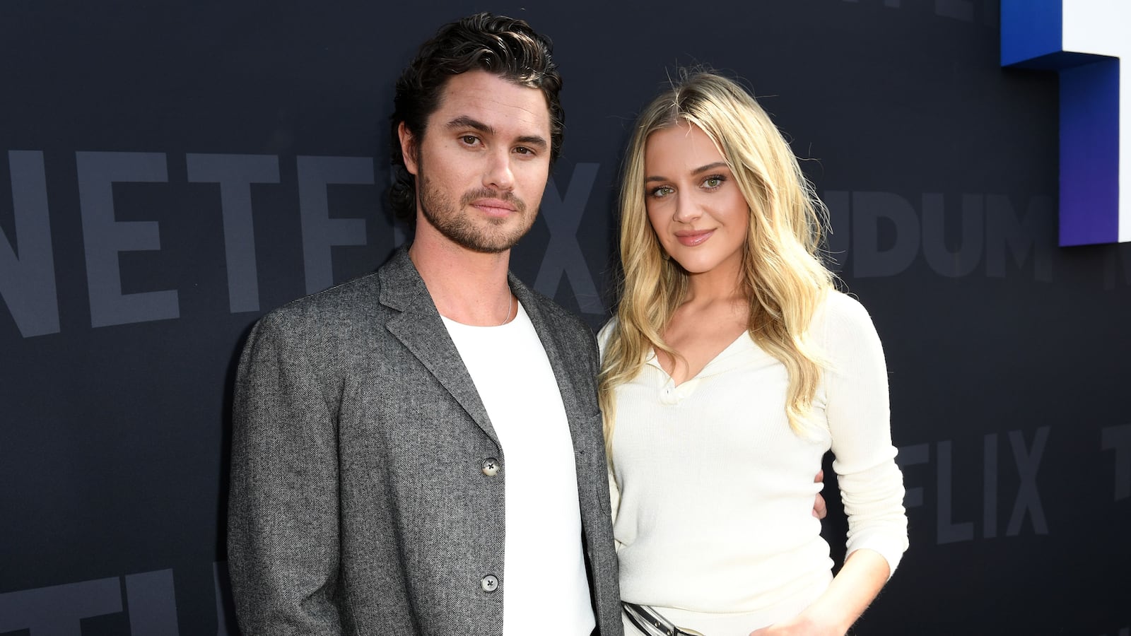 INGLEWOOD, CALIFORNIA - MAY 31: (L-R) Chase Stokes and Kelsea Ballerini attend NETFLIX TUDUM 2025: THE LIVE EVENT at The Kia Forum on May 31, 2025 in Inglewood, California.