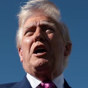 U.S. President Donald Trump speaks to the media, before boarding Air Force One on his way to Virginia, at Joint Base Andrews in Maryland, U.S., April 10, 2026. REUTERS/Evelyn Hockstein