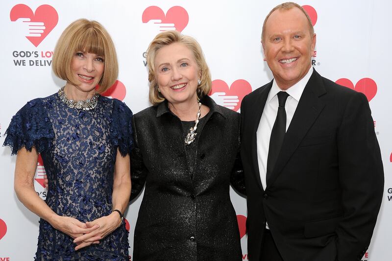 articles/2013/10/17/hillary-clinton-receives-first-ever-michael-kors-award-for-outstanding-community-service-karl-lagerfeld-to-teach-master-class-in-paris/131017-kors-wintour-clinton-fashion-cheat_jhijbo